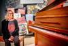 John Lennon's sister Julie Baird with the Imagine piano 